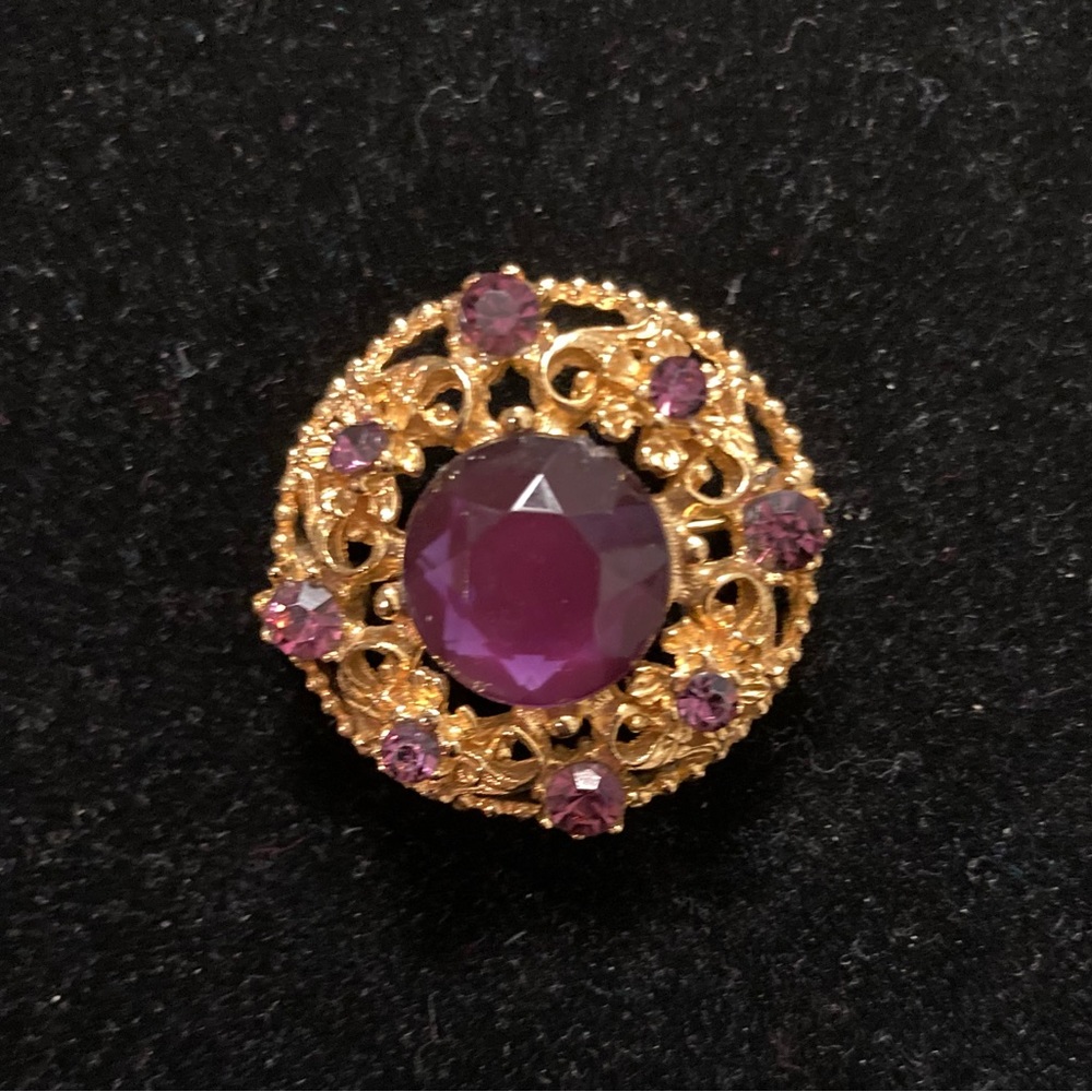 Vintage Selini Gold Toned Round Filigree Brooch With Purple Rhinestones